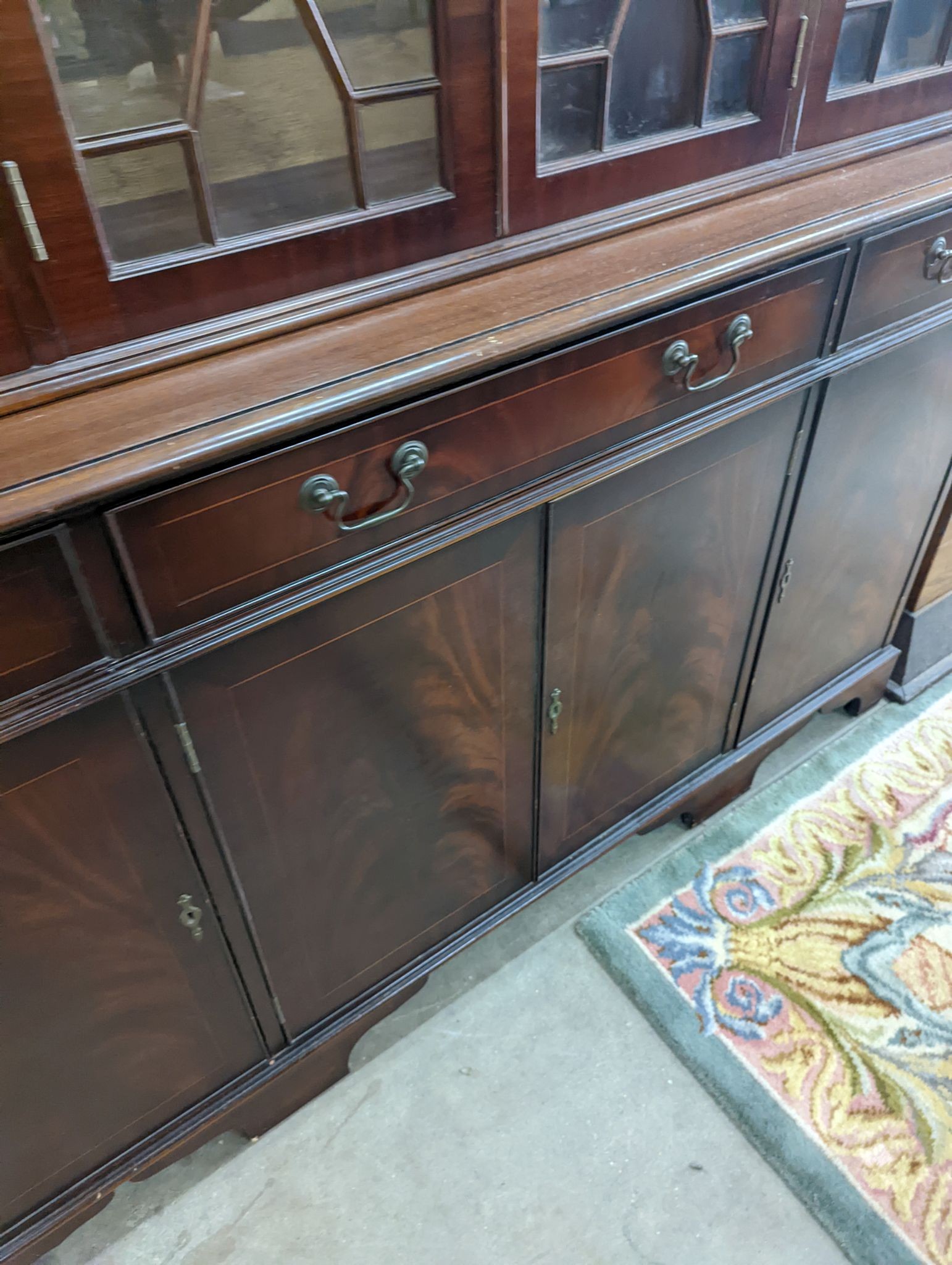 A reproduction George III style mahogany library bookcase, length 154cm, depth 41cm, height 193cm